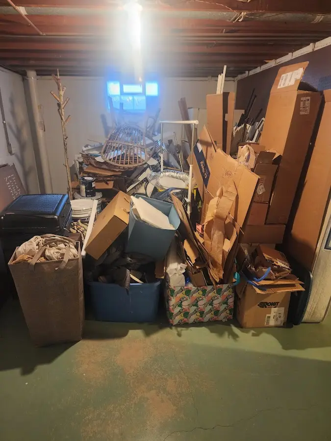 Roll-off dumpster container at job site for Cleanout Dumpster Rental in Willard